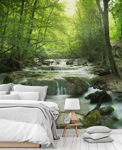mural verde personalizable de papel pintado de bosque llamado Enchanting Forest Waterfall para hogares y oficinas.