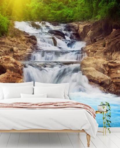 Blauer felsiger Wasserfall Tapete