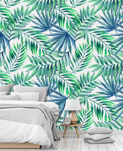 papel pintado de hojas tropicales en tonos azules y verdes