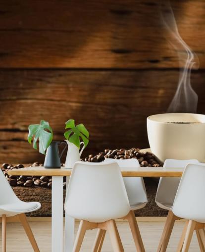 Hot Cup of Coffee and Spilled Coffee Beans Wallpaper