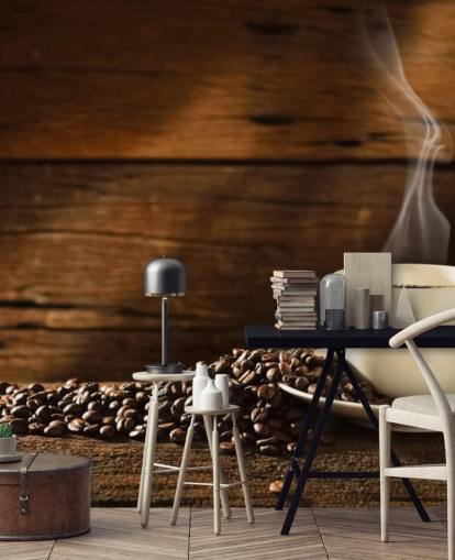 Fondo de pantalla de taza de café caliente y granos de café derramados