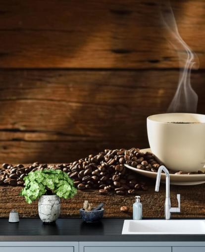 Hot Cup of Coffee and Spilled Coffee Beans Wallpaper