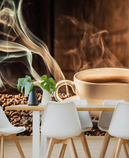 Mural de pared Taza de café humeante con granos de café