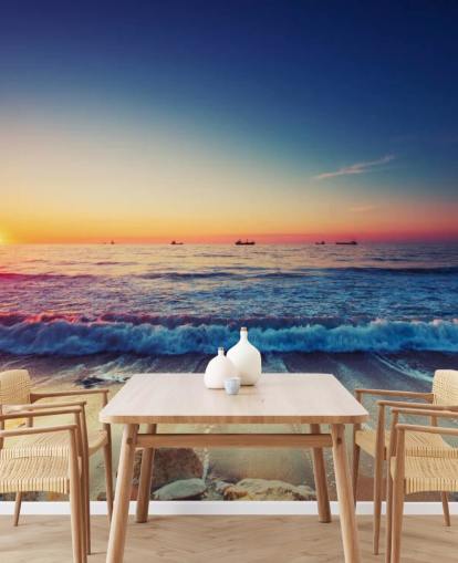 carta da parati murale arancione e blu con tramonto chiamato Colourful Sunrise Over the Sea per camere da letto, uffici domestici e salotti