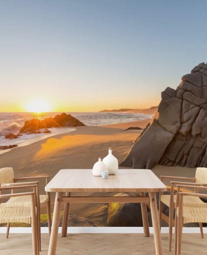 Fondo de pantalla de playa rocosa con un hermoso atardecer