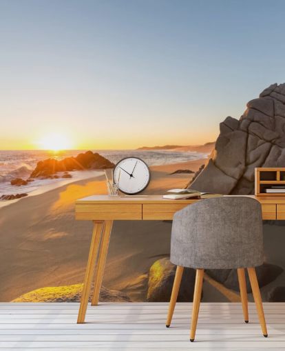 Fondo de pantalla de playa rocosa con un hermoso atardecer