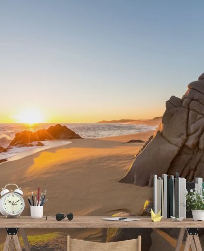 Fondo de pantalla de playa rocosa con un hermoso atardecer