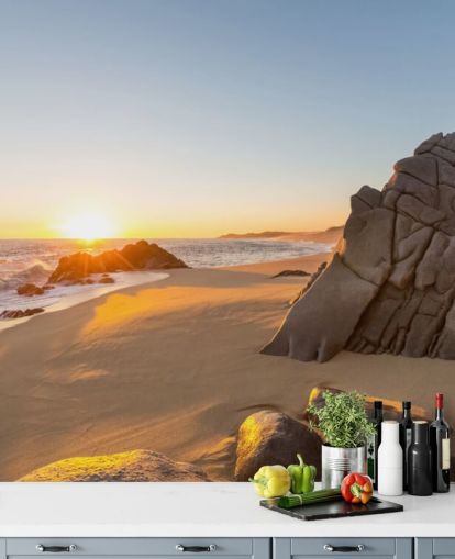 Rocky Beach with a Beautiful Sunset Wallpaper