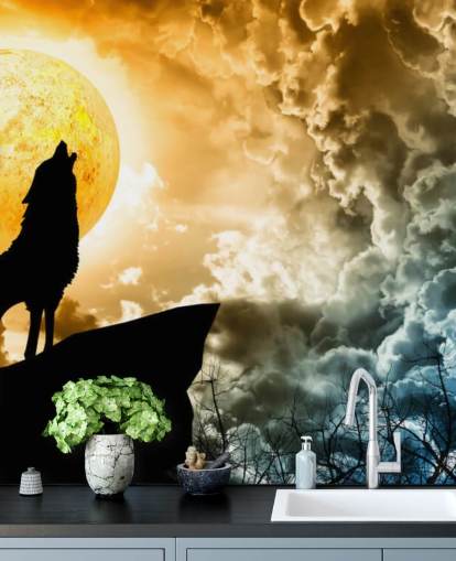 Heulender Wolf bei Sonnenuntergang Wallpaper