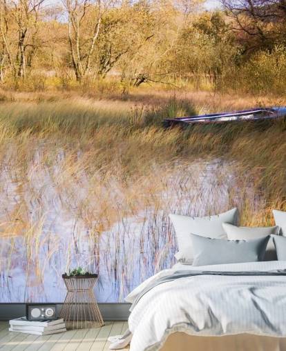 Boat Resting Amongst Reeds on Lake Wall Mural