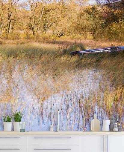 Boat Resting Amongst Reeds on Lake Wall Mural Boat Resting Amongst Reeds on Lake Wall Mural