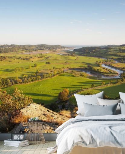 Solnedgang i grønt landskap Landskap Mural