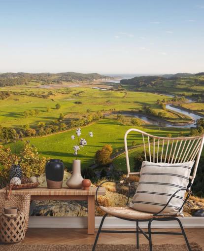 Zonsondergang in groen landschap muurschildering Zonsondergang in groen landschap muurschildering
