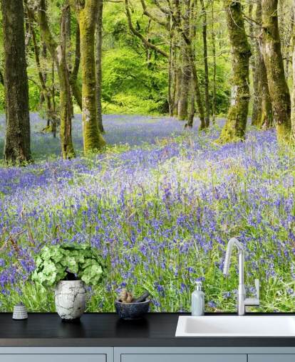 blue and green custom forest wallpaper mural called Into the Blue by Phil McMenemy for living rooms