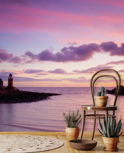 Roze zonsondergang bij kustmuurschildering