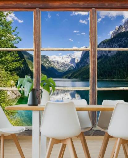 Decorazione murale con finestra con vista sulle montagne innevate