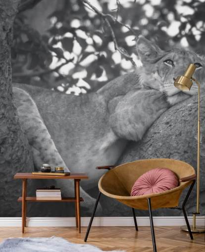 Decorazione murale con leone appoggiato su un ramo