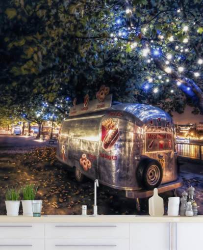 silver caravan in lit forest wallpaper