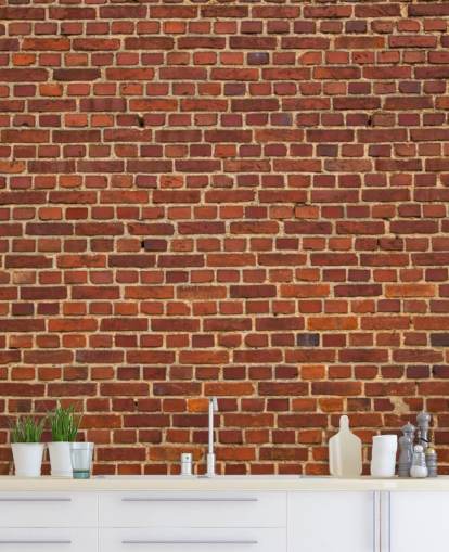 Vecchia carta da parati con mattoni rossi