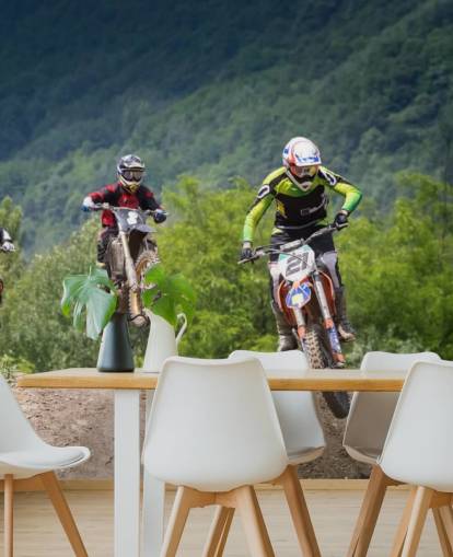 Motocross Racers Going Over a Hill Wallpaper Motocross Racers Going Over a Hill Wallpaper