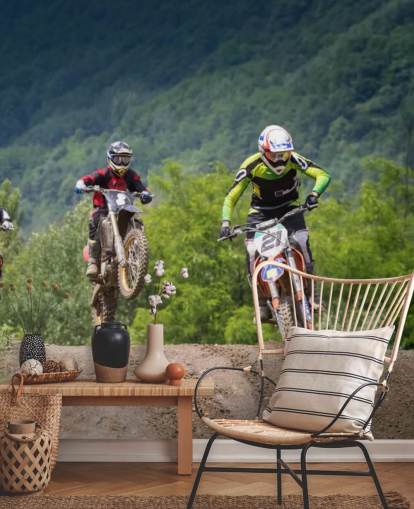 Motocross Racers Going Over a Hill Wallpaper