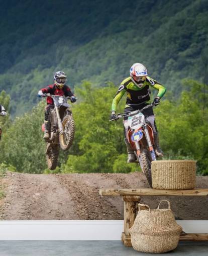 Fondo de pantalla de corredores de motocross que van sobre una colina Fondo de pantalla de corredores de motocross que van sobre una colina