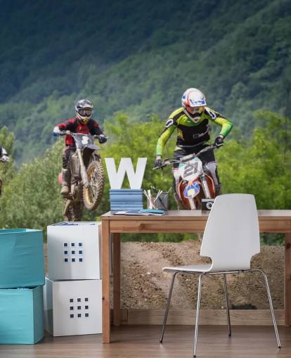 Sfondo Motocross Racers Going Over a Hill Sfondo Motocross Racers Going Over a Hill