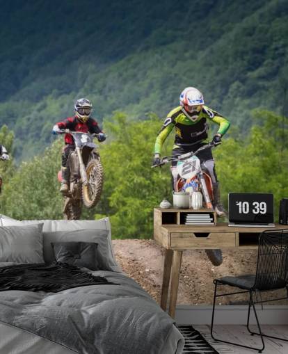 Motocross-Rennfahrer gehen über einen Hügel Wallpaper