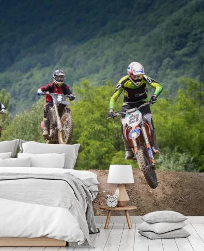 Fondo de pantalla de corredores de motocross que van sobre una colina Fondo de pantalla de corredores de motocross que van sobre una colina