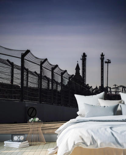 Lewis Hamilton Racing in Distance on Track fondo de pantalla