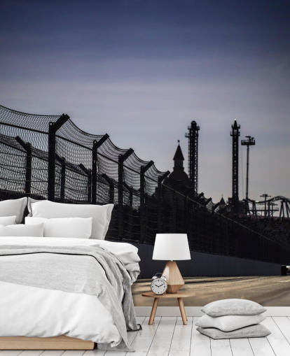 Lewis Hamilton Racing in Distance on Track fondo de pantalla