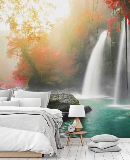 red leafed trees and misty waterfall wallpaper