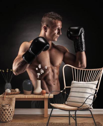 Boxer posiert mit schwarzem Hintergrund Wallpaper