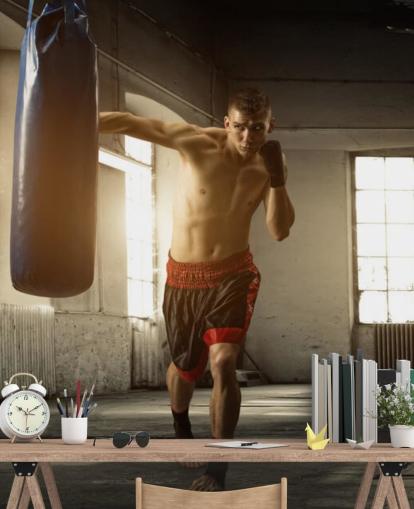 Fondo de pantalla de Young Man Boxing in Warehouse