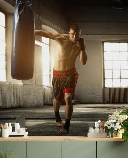 Young Man Boxing in Warehouse Wallpaper
