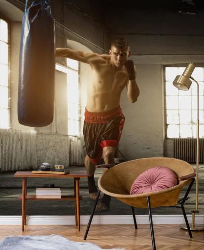 Papier peint Jeune homme boxant dans un entrepôt