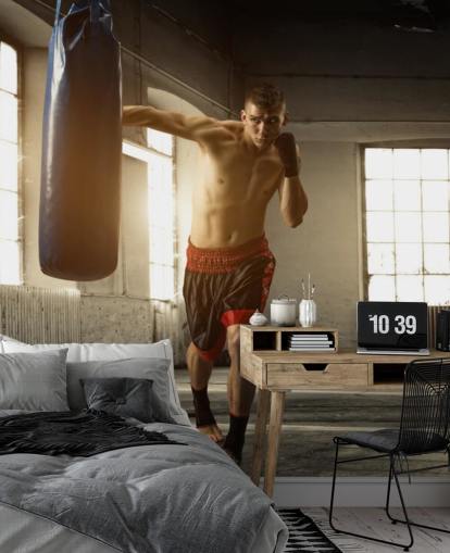 Fondo de pantalla de Young Man Boxing in Warehouse