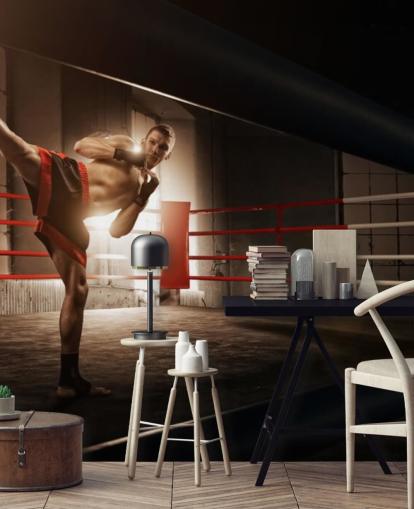 Papel pintado Joven boxeador pateando en el ring