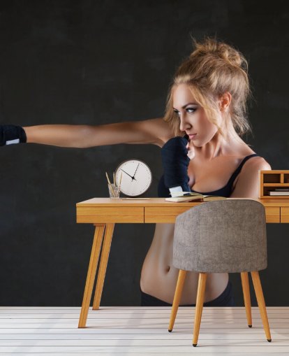Sexy boxer woman making kick with boxing bandage mural