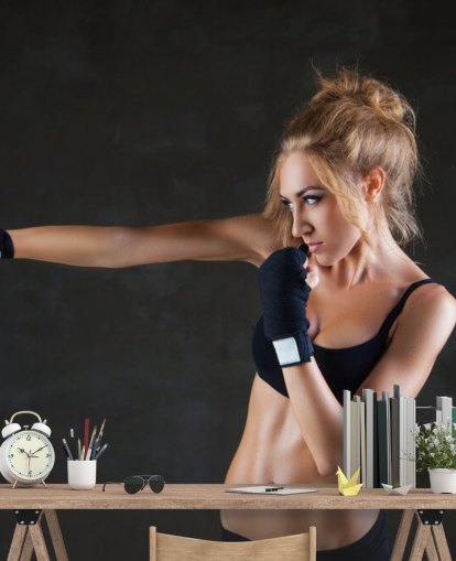 Sexy boxer woman making kick with boxing bandage mural Sexy boxer woman making kick with boxing bandage mural