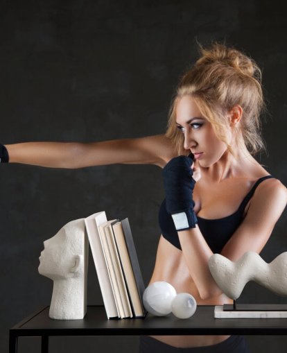 Sexy boxer woman making kick with boxing bandage mural