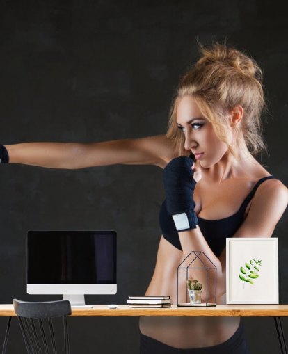 Sexy boxer woman making kick with boxing bandage mural