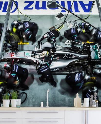 Mechanics with Lewis Hamilton's Car Wallpaper