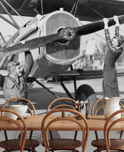 Couple Playing with a Propeller on a Plane Mural 