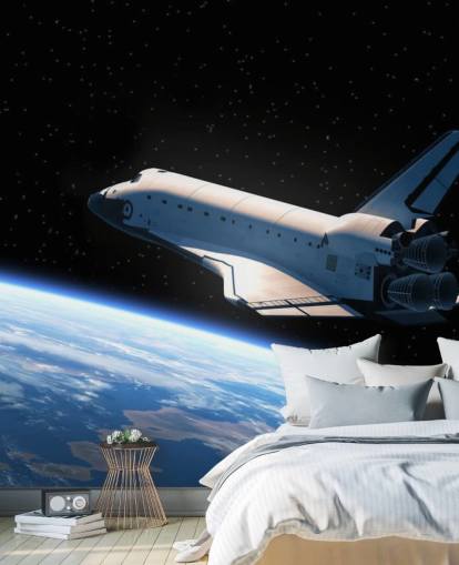 Space Shuttle umkreist Erde Tapete