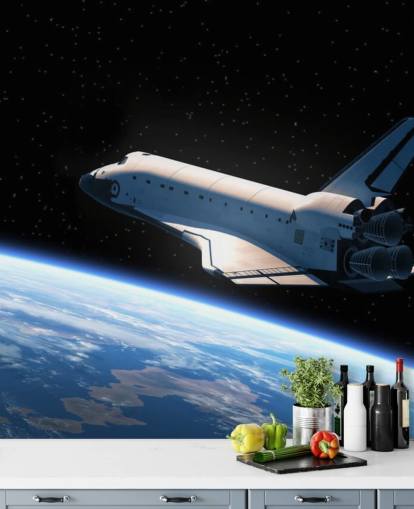 Space Shuttle umkreist Erde Tapete