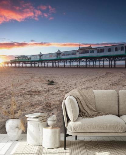 Fondo de pantalla de playa y muelle al atardecer