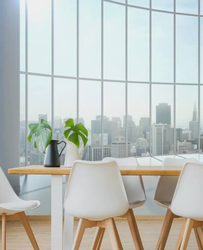 Round window view of city wallpaper