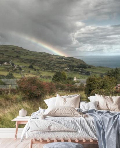 Stormachtige regenboog in landelijke muurschildering