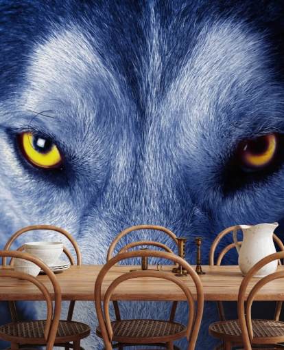 Primer plano de la cara de lobos ojos amarillos y papel tapiz de piel azul Primer plano de la cara de lobos ojos amarillos y papel tapiz de piel azul